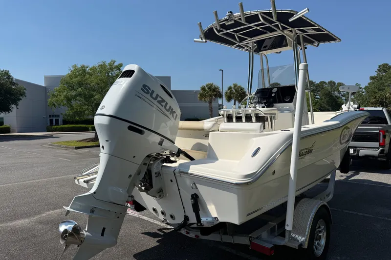 Slide: The Image of 2022 Bulls Bay 200 Center Console boat with Suzuki outboard motor on trailer. - 5