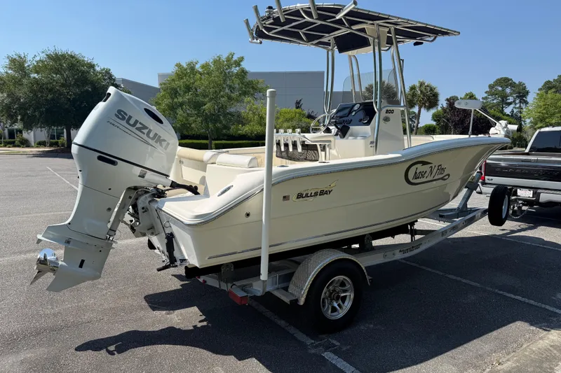 Slide: The Image of 2022 Bulls Bay 200 Center Console boat with Suzuki outboard motor on trailer. - 6