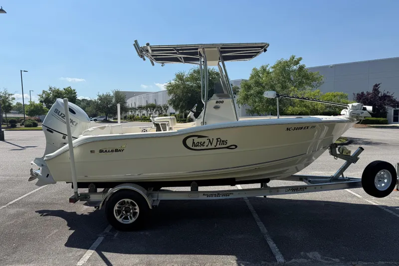 Slide: The Image of 2022 Bulls Bay 200 Center Console boat on trailer in parking lot. - 7