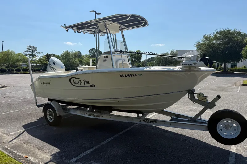 Slide: The Image of 2022 Bulls Bay 200 Center Console boat on trailer in parking lot. - 8