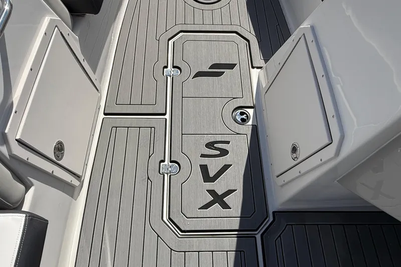 Slide: The Image of 2026 Starcraft SVX 191 OB boat deck with sleek design and storage compartments. - 10