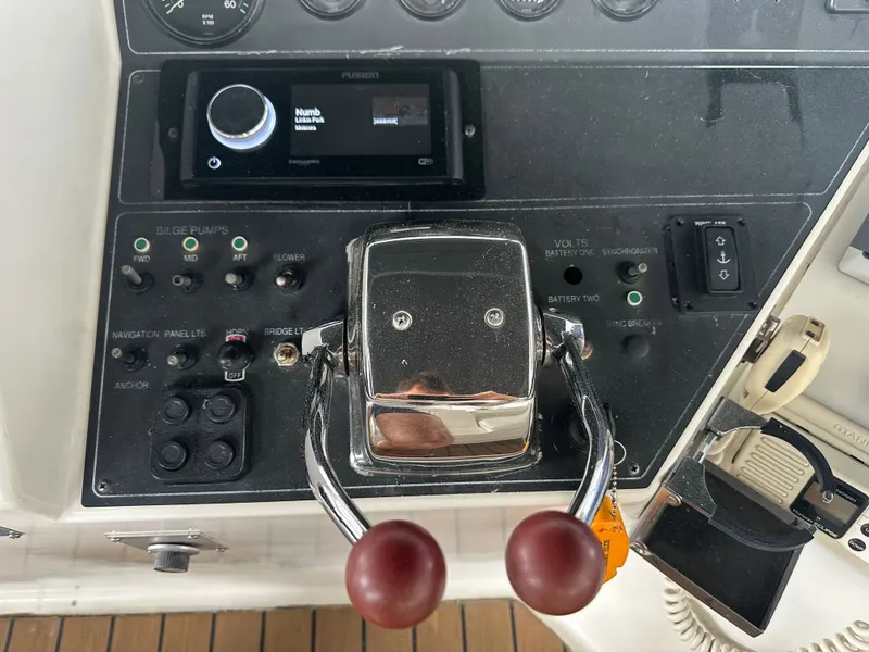 Slide: The Image of Control panel of a 1993 Carver Cruiser 440 with various controls. - 10