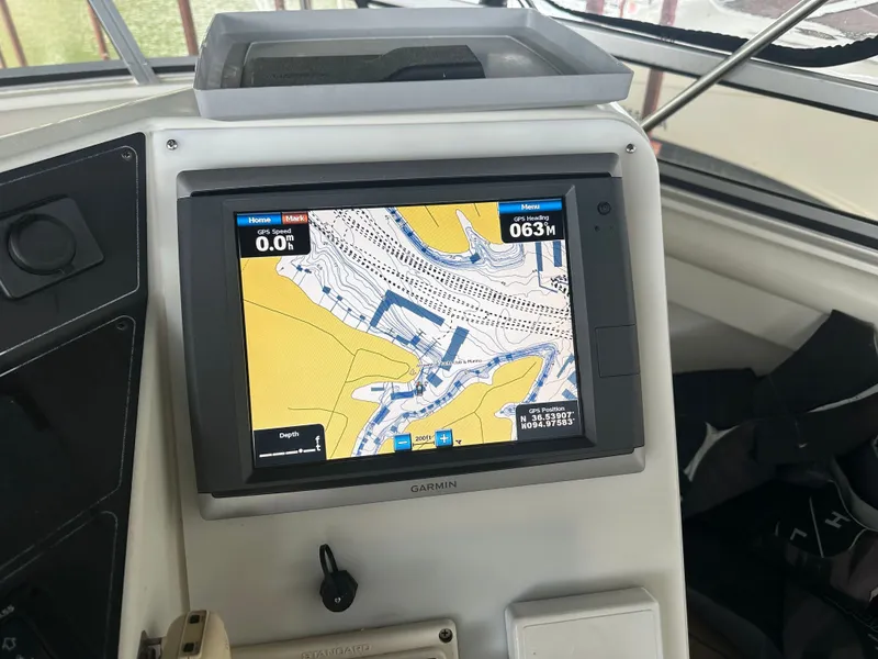 Slide: The Image of Garmin GPS on 1993 Carver Cruiser 440 displaying nautical chart. - 14