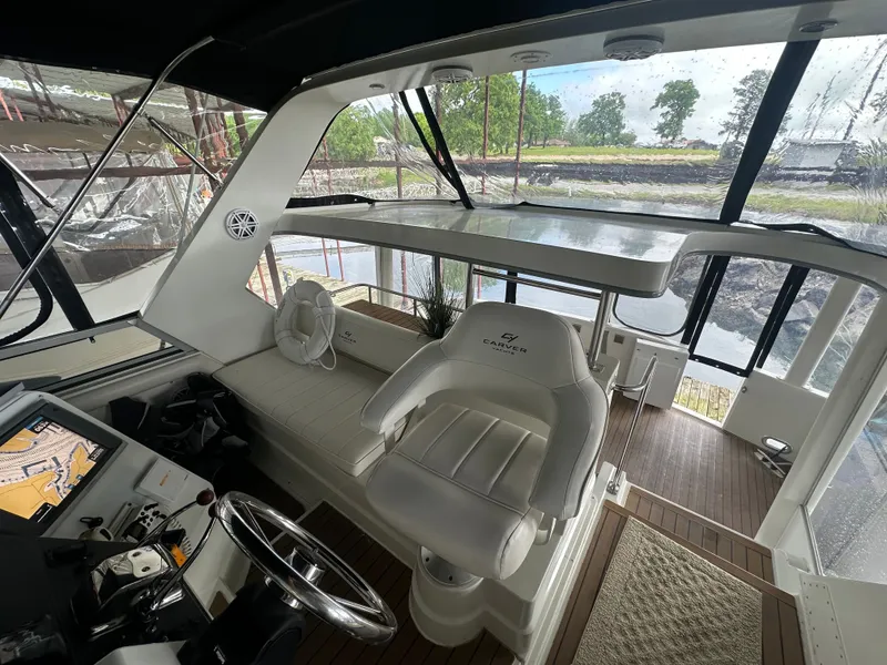 Slide: The Image of Interior of a 1993 Carver Cruiser 440 yacht with helm station. - 17