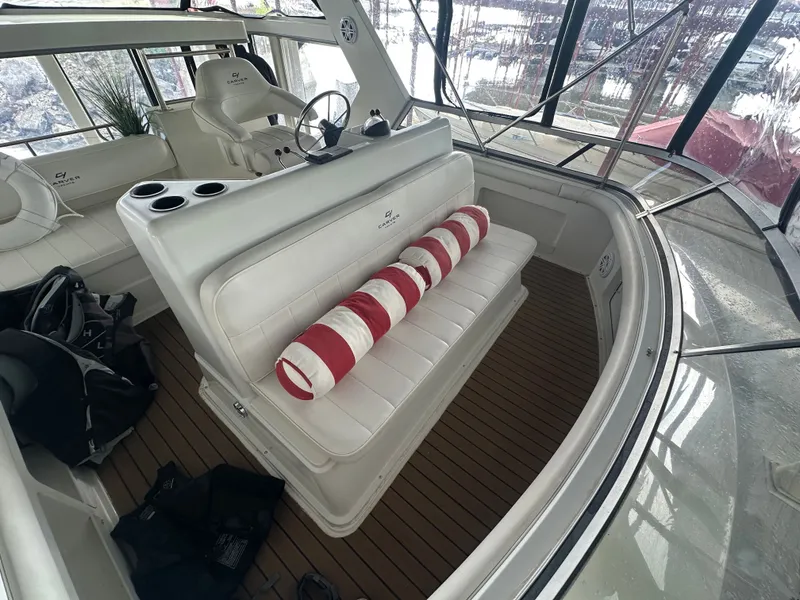 Slide: The Image of Interior of 1993 Carver Cruiser 440 yacht with white seating. - 18