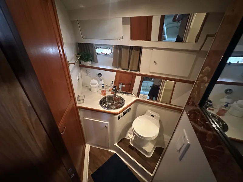 Slide: The Image of Interior of 1993 Carver Cruiser 440 yacht, bathroom view. - 29