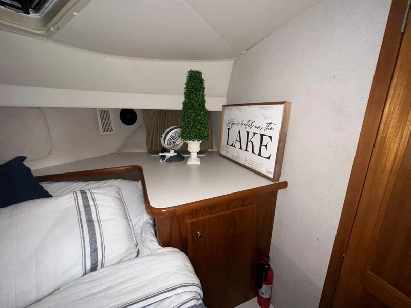Slide: The Image of 1993 Carver Cruiser 440 interior with lake-themed decor. - 32