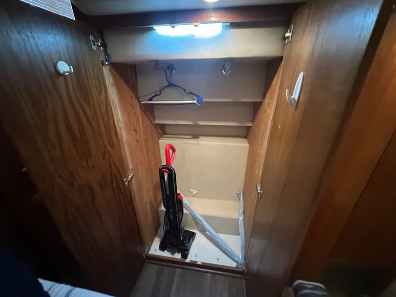 Slide: The Image of Interior of a 1993 Carver Cruiser 440 with storage space. - 37