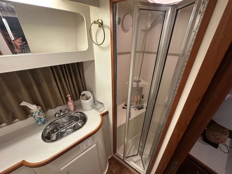Slide: The Image of Bathroom in 1993 Carver Cruiser 440 with shower and sink. - 40