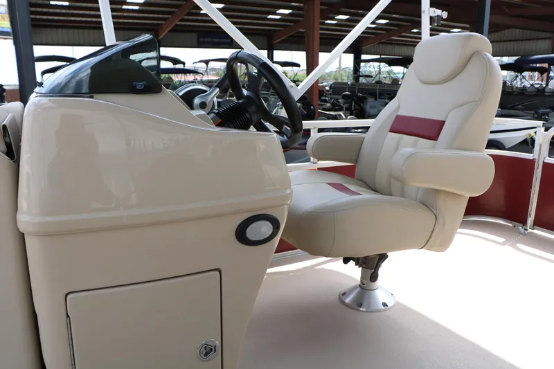 Slide: The Image of 2016 Lowe SS 190 boat interior with beige captain's chair and steering console. - 30
