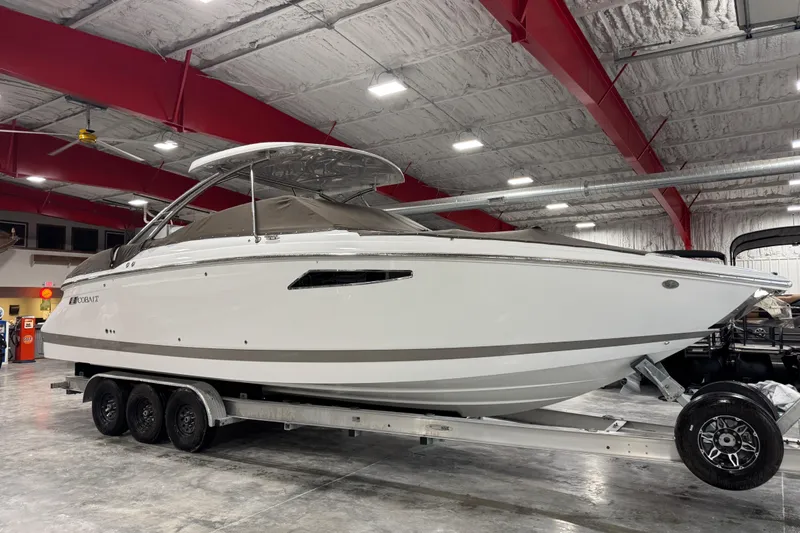 Slide: The Image of 2018 Cobalt boat on trailer in indoor storage facility. - 22