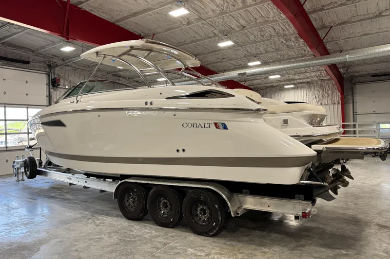 Slide: The Image of 2018 Cobalt boat on trailer in indoor storage facility. - 3