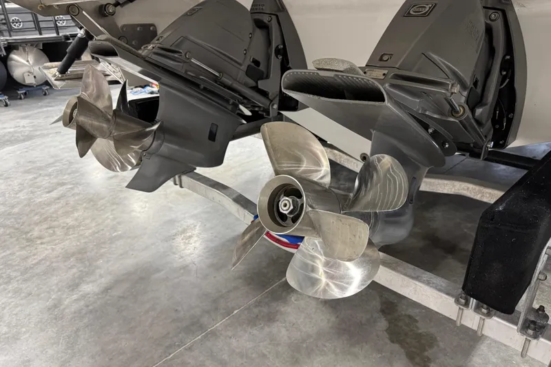 Slide: The Image of 2018 Cobalt boat propellers in a garage setting, showcasing dual stainless steel blades. - 6