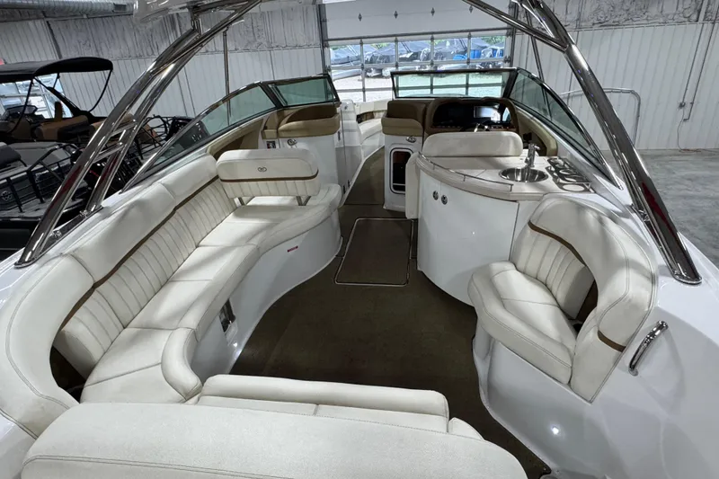 Slide: The Image of Luxurious 2018 Cobalt boat interior with plush white seating and sleek design. - 8