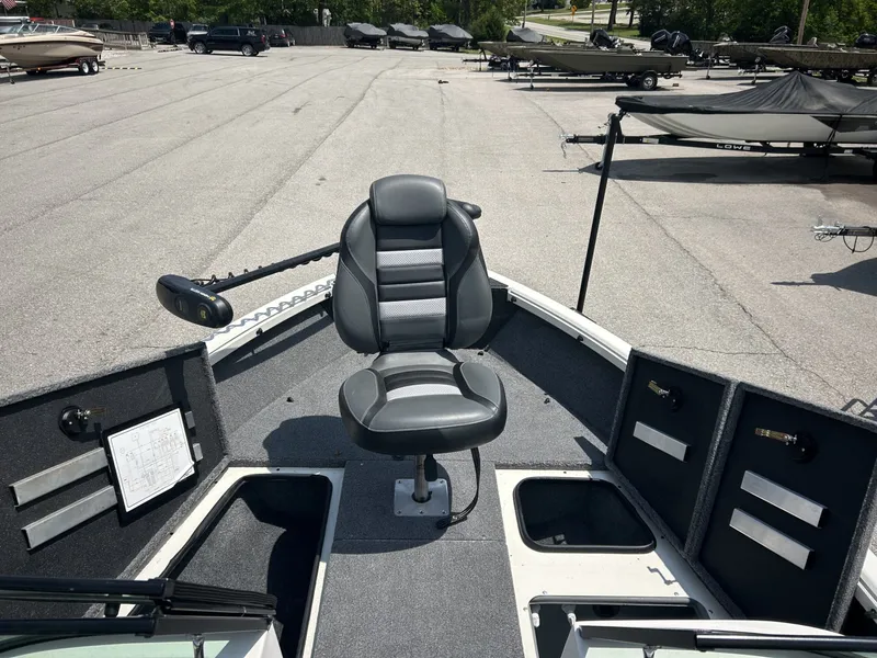 Slide: The Image of 2023 Ranger VS1882 WT boat with seat and storage compartments. - 11