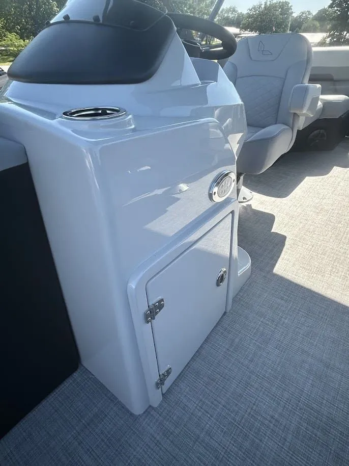 Slide: The Image of 2024 Lowe SS230 WV boat console with seating and storage. - 13