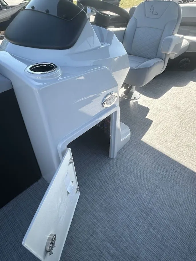Slide: The Image of Interior of 2024 Lowe SS230 WV with helm console and seat. - 14