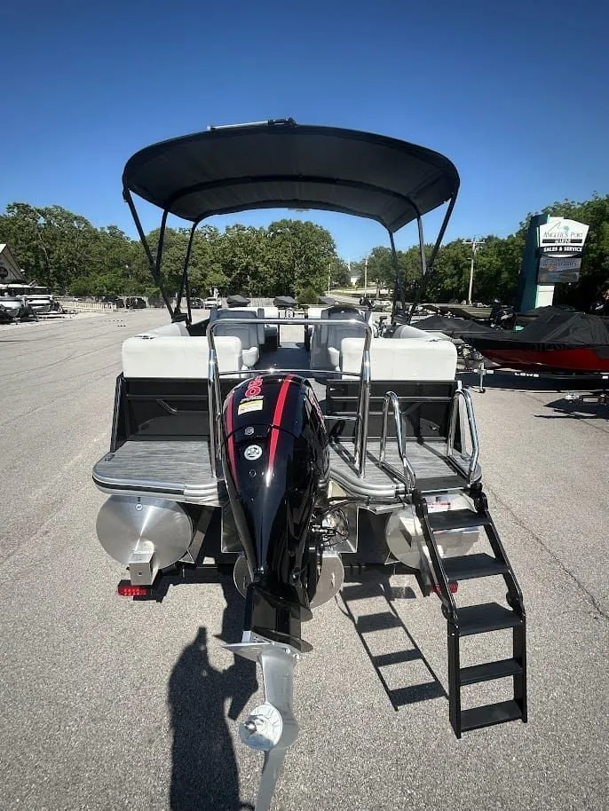 Slide: The Image of 2024 Lowe SS230 WV pontoon boat with outboard motor and canopy. - 3