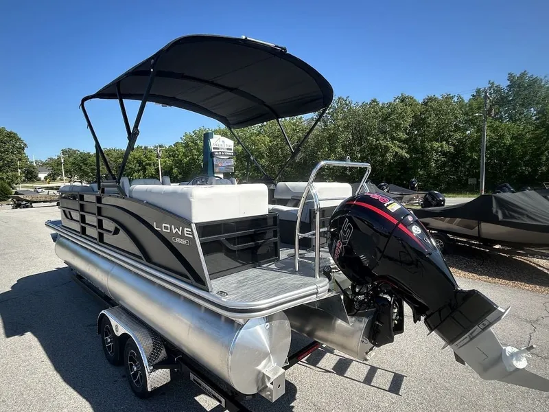 Slide: The Image of 2024 Lowe SS230 WV pontoon boat with outboard motor. - 4