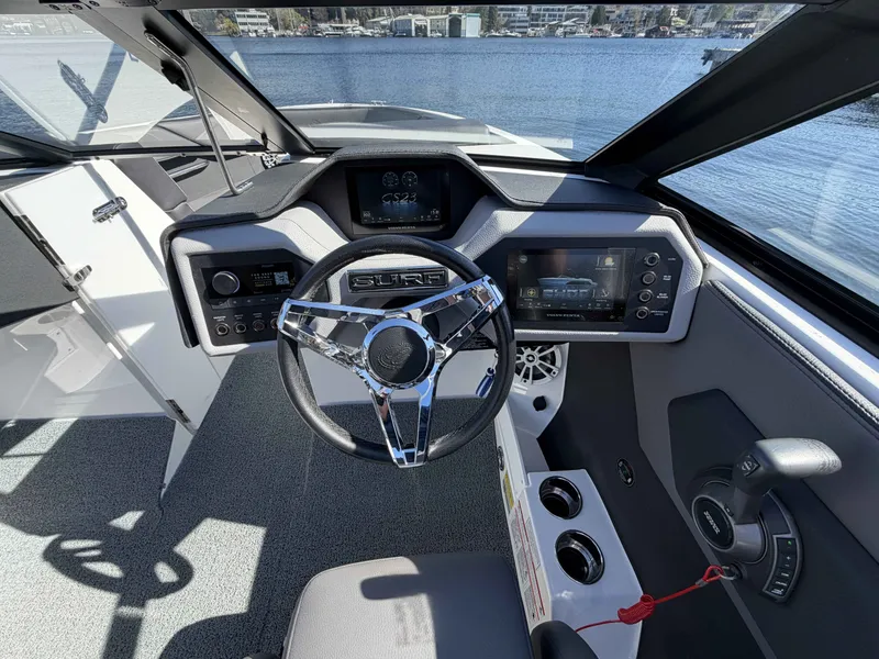 Slide: The Image of Interior view of 2025 Cobalt CS23 Surf boat cockpit. - 15