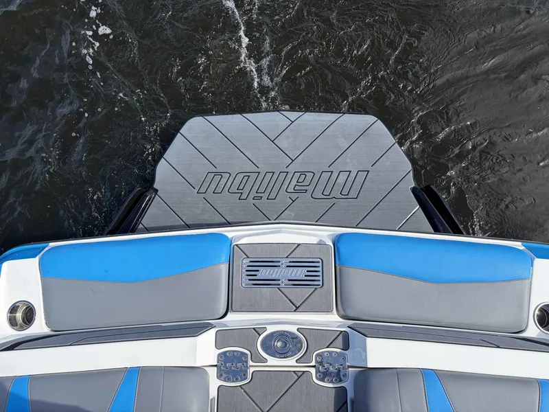 Slide: The Image of Rear view of 2025 Malibu Wakesetter 22 LSV on water. - 10