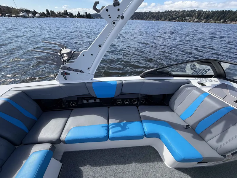 Slide: The Image of Interior of 2025 Malibu Wakesetter 22 LSV with blue and gray seating. - 13