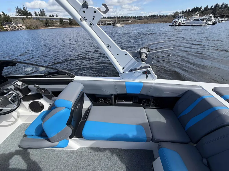 Slide: The Image of Interior of 2025 Malibu Wakesetter 22 LSV on a lake. - 15