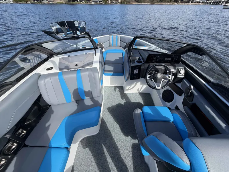 Slide: The Image of Interior of 2025 Malibu Wakesetter 22 LSV on the water. - 16