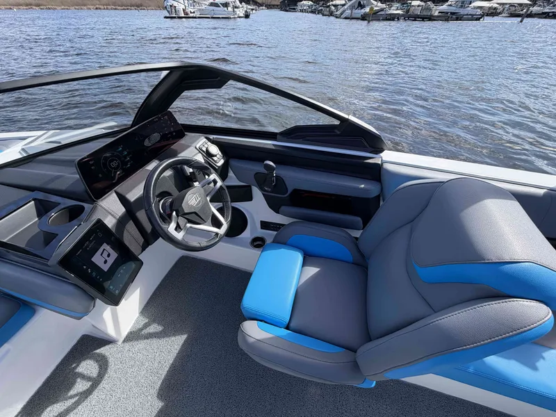 Slide: The Image of Interior of 2025 Malibu Wakesetter 22 LSV with modern helm. - 18