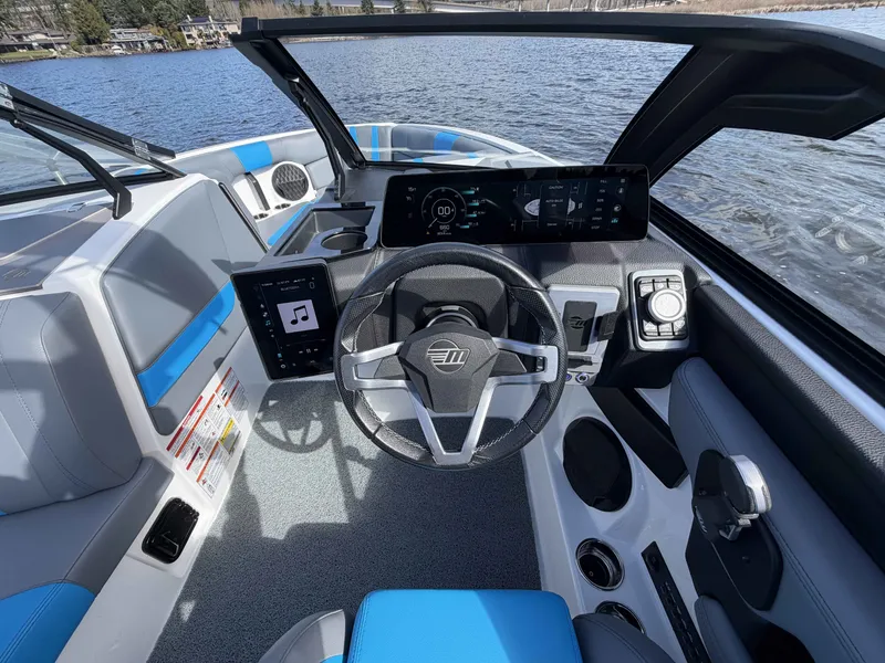 Slide: The Image of Interior of 2025 Malibu Wakesetter 22 LSV with modern dashboard. - 19