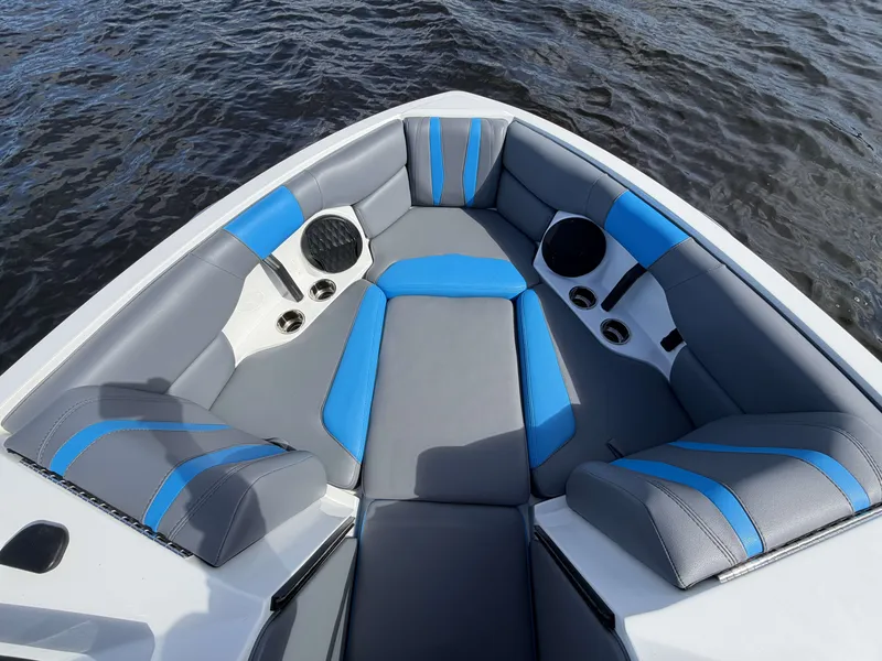Slide: The Image of 2025 Malibu Wakesetter 22 LSV interior with blue and gray seating. - 20