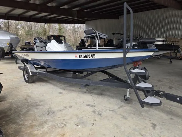 The Image of 2022 Avid 18 XB boat on trailer in storage facility. - 1