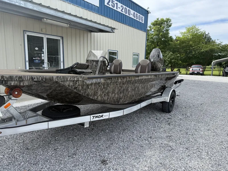 Slide: The Image of Thor Lake Hammer 1900 SC 140HP boat on trailer, 2026 model. - 2