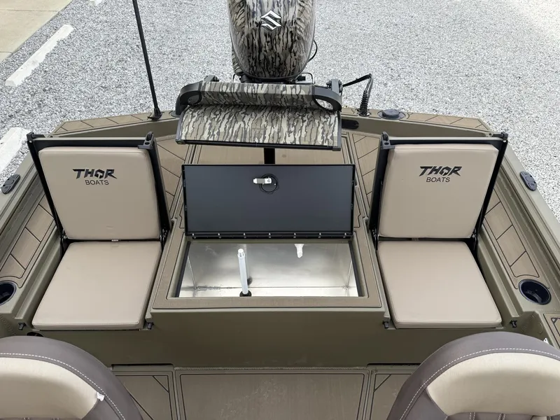 Slide: The Image of Thor Lake Hammer 1900 SC 2026 boat interior with seats and storage. - 4