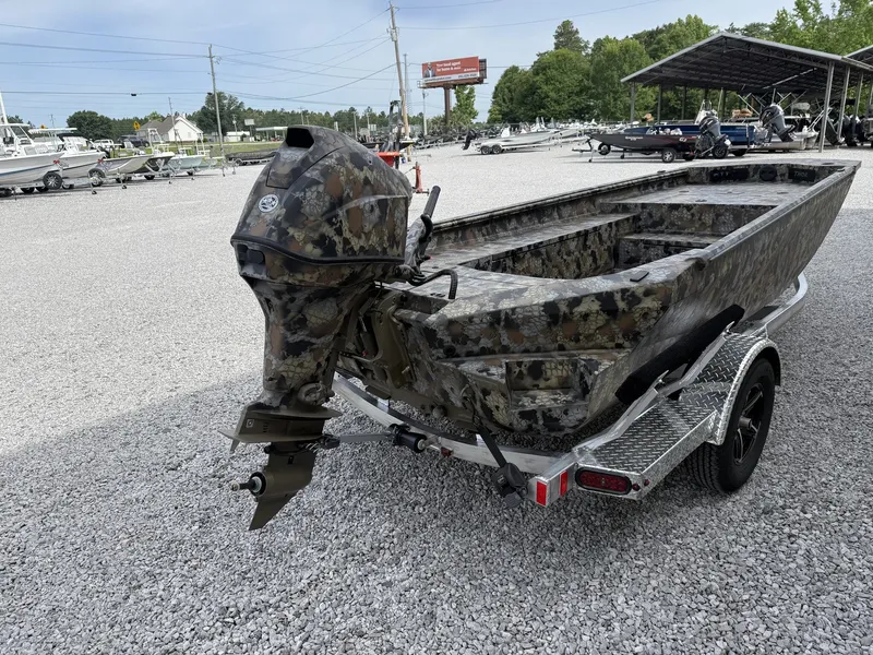 Slide: The Image of 2026 Thor Fish Hammer boat with Tohatsu 60 engine on trailer. - 4
