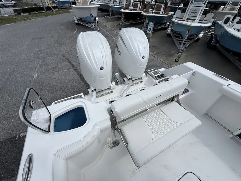 Slide: The Image of 2026 Tidewater 272 CC Adventure with dual outboard engines. - 16