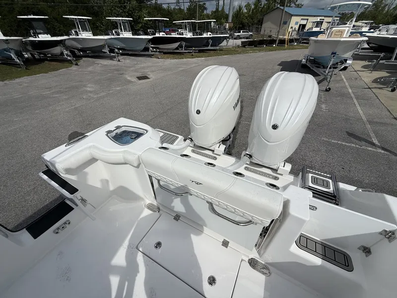 Slide: The Image of 2026 Tidewater 272 CC Adventure with dual outboard engines. - 17