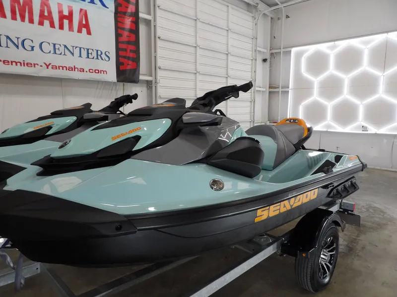 Slide: The Image of 2023 Sea-Doo Wake 170 jet ski in a showroom. - 8