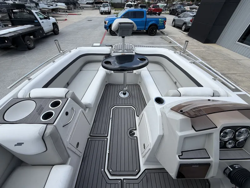 Slide: The Image of Interior of 2023 Starcraft SXV-211 boat with seating area and table. - 21