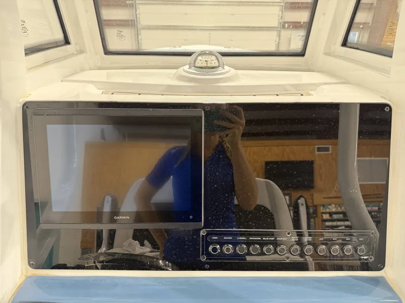 Slide: The Image of Dashboard of Tidewater 232 CC Adventure 2026 with Garmin display. - 21