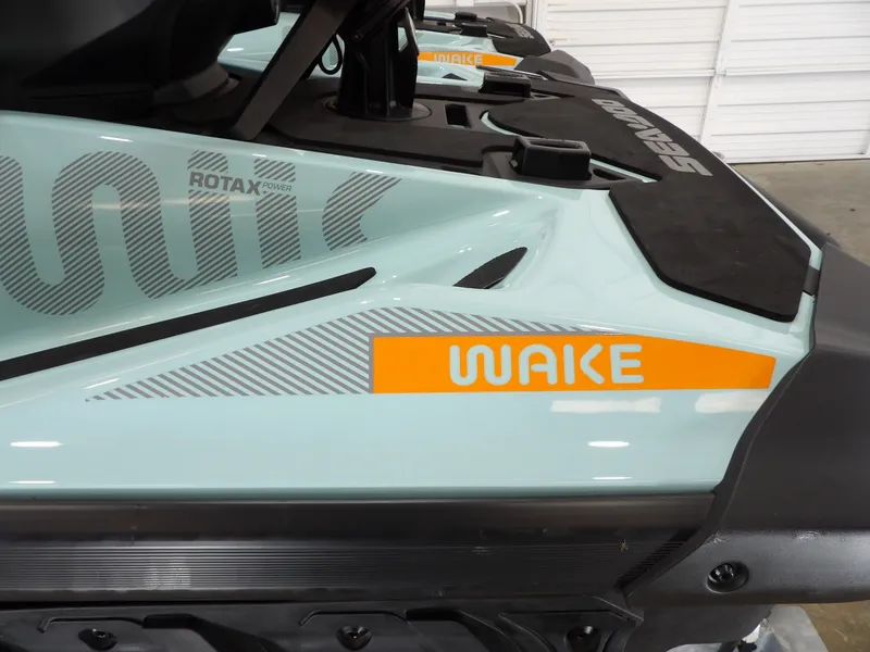 Slide: The Image of 2023 Sea-Doo Wake 170 with Rotax Power branding. - 10