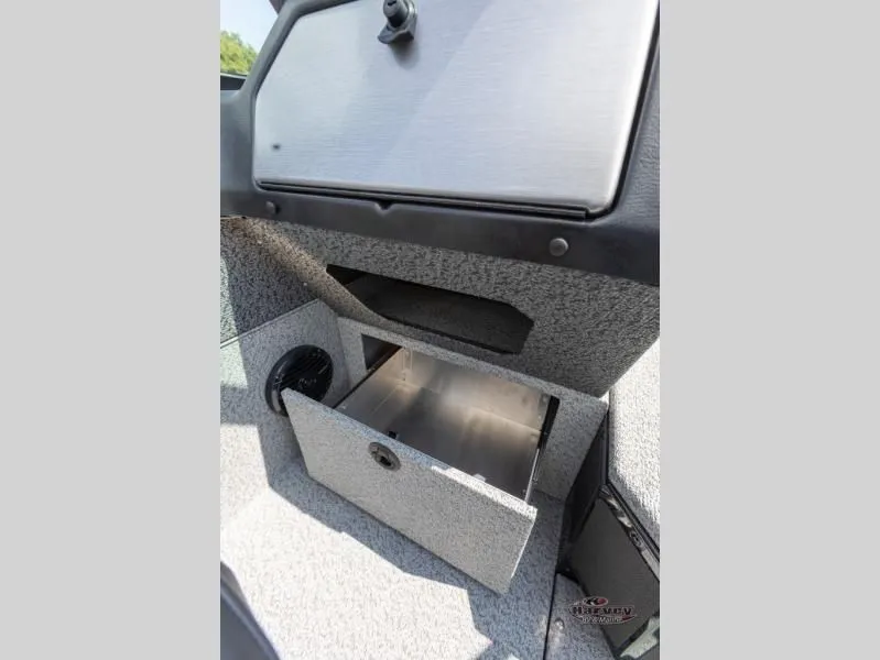 Slide: The Image of Interior view of 2026 Impact XS 2075 Sport boat with storage compartment. - 16