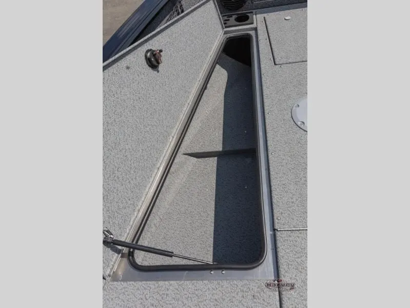 Slide: The Image of Open storage compartment in Impact XS 2075 Sport boat, year 2026. - 19