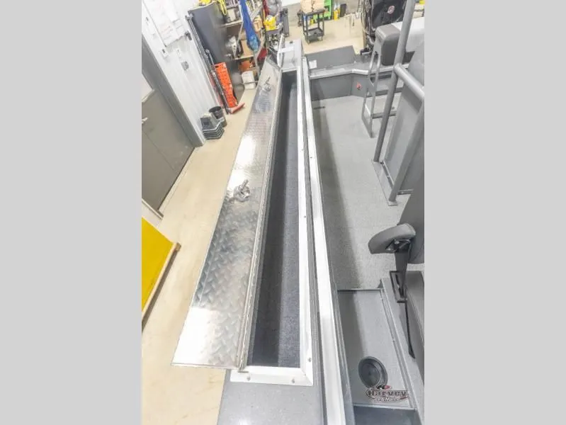 Slide: The Image of Interior view of Rush 209 boat, 2026 model, featuring storage compartment. - 16