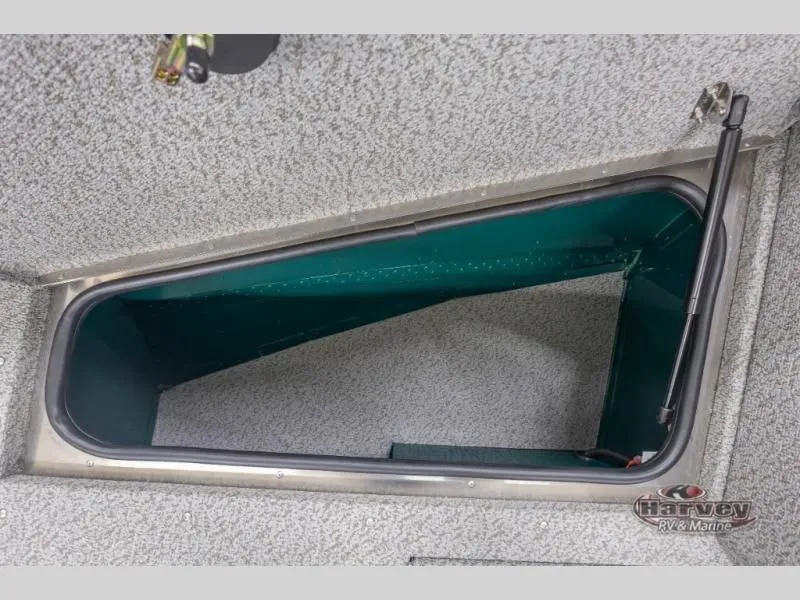 Slide: The Image of Interior view of Adventure 1675 Sport 2026 boat compartment. - 10