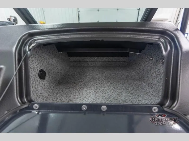 Slide: The Image of Interior of Adventure 1675 Sport 2026 with gray carpeting. - 13