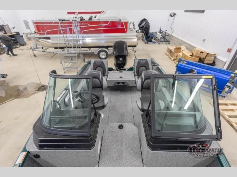 Slide: The Image of 2026 Adventure 1675 Sport boat inside a workshop. - 7