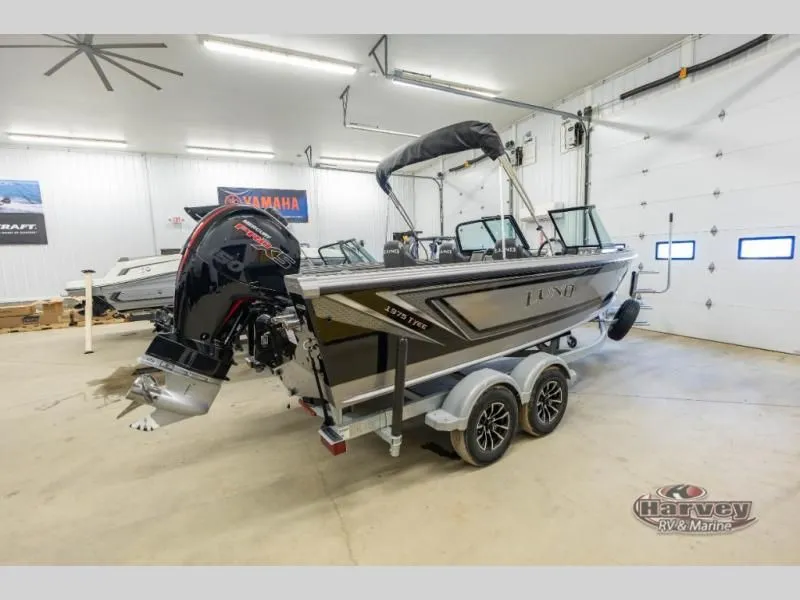 Slide: The Image of 2026 TYEE 1975 Sport boat on trailer in garage. - 6