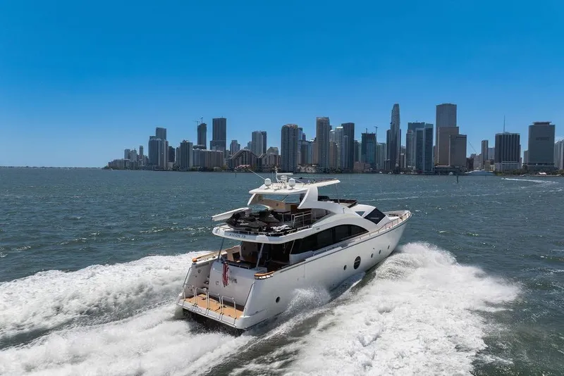 Slide: The Image of Aicon 75 yacht cruising near city skyline, 2008 model. - 4