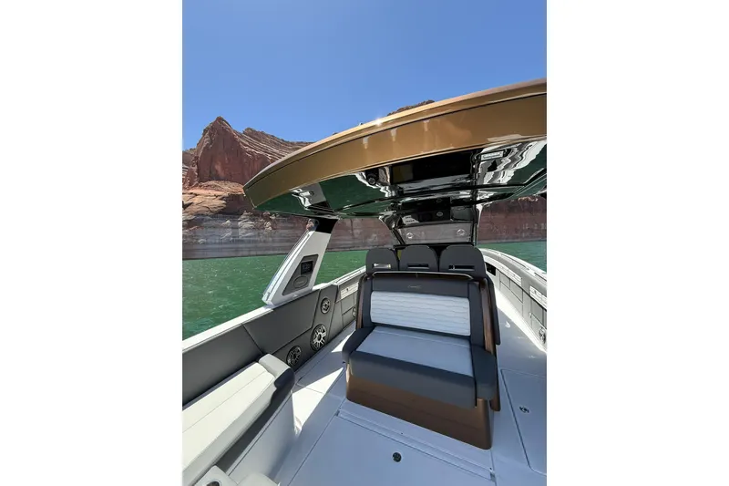 Slide: The Image of 2024 Cigarette 42' Auroris boat interior with scenic canyon backdrop. - 20